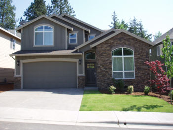 photo of garage side of completed Avocet home plan